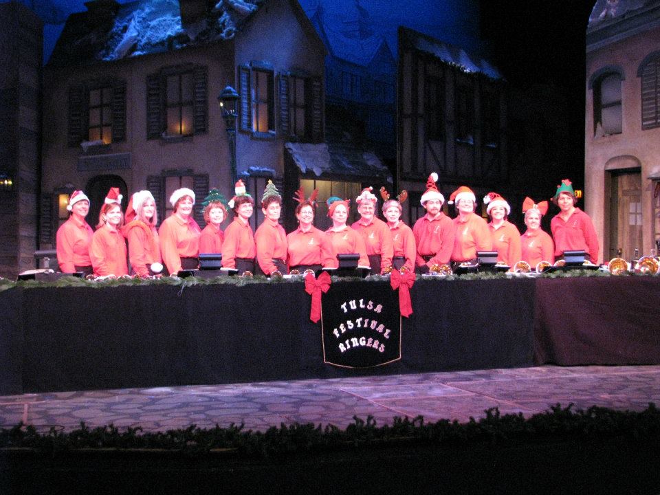 Ringers in red shirts performing at the Tulsa Performing Arts Center